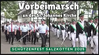 Vorbeimarsch an der St. Johannes Kirche