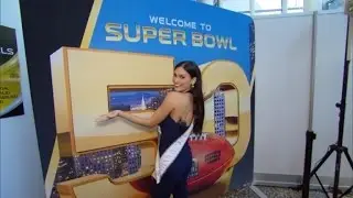 Police Officer Takes Airport Selfie with Miss Universe