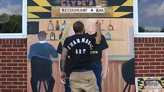 Painting Portraits on a Mural