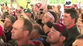 Brazil's Lula rallies support, draws protest, as arrest looms