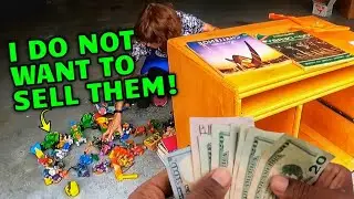 I TRIED TO BUY THEM ALL AT THIS GARAGE SALE!