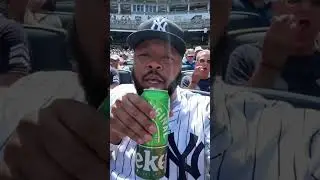 Trying beer at a baseball game