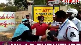 Woman Attacked On Traffic Police in Hyderabad.