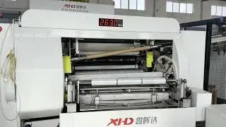 XHD brand high quality 4 shaft center winding stretch film machine running in customer company