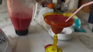 Making a Refreshing Raspberry strawberry mango smoothie