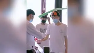 'One-meter hats' help tourists in China's Hunan Province practice social distancing