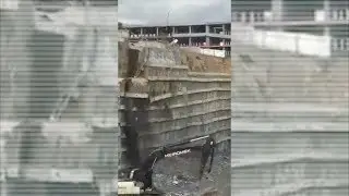 Earth-anchored retaining wall collapse