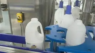 Rotary roll fed labeler hot melt labeling machine