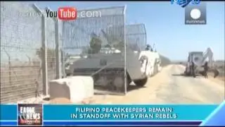 Filipino peacekeepers remain in standoff with Syrian rebels