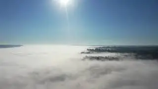 An Amazing Drone Flight Above Morning River Valley Fog