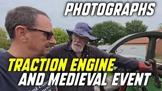 Photographs a traction engine and medieval event