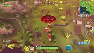 Search between a Pool, Windmill and Umbrella | Fortnite