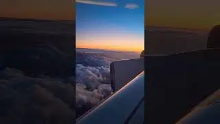 Beautiful Sunset from a Plane ✈️ ☁️🌅#shorts #viral #beautiful #flying