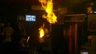 Fiery cocktail from the bartender . Fire show 2018 . All look Fiery serpent