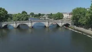 4K Richmond bridge and riverside Richmond upon Thames Surrey UK aerial drone stock footage clip