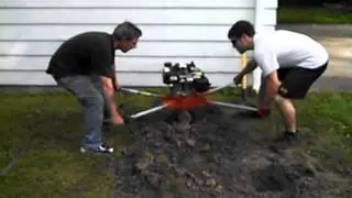 Using a two-man auger at Dennis's #1