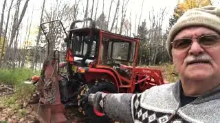 Firewood with a Kubota tractor and a logging winch