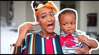 DOING MY MAKEUP WITH BABY KAISER!!