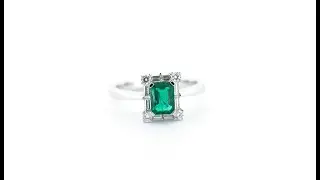 Witgouden ring bezet met smaragd en diamant - Zilver.nl