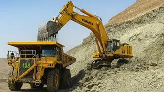 Komatsu PC1250 Excavator Loads Komatsu Haul Truck with Iron Ore – Mining Power in Action!