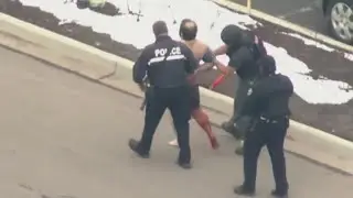 Colorado grocery store shooting: Bloodied, handcuffed man led from scene