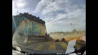 Runaway truck takes out a garbage truck and two cars