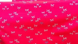red fabric with small flowers by Art Gallery Fabrics