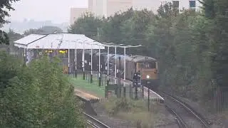 GBRf 73128 and 73141 passing Morden South