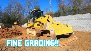 Fine grading a pond with a CAT 953K!
