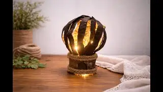 Dekorative Lampe aus Karton und Schoten der Kupferakazie | DIY Idee