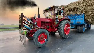 Modified Belarus 510 Tractor Pulling Heavy Loaded Sugarcane 8-Wheeler Trailer