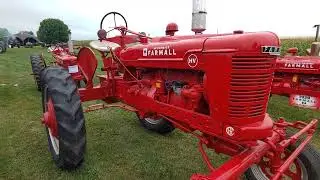 A very nice Farmall HV with original factory wide front walk around.