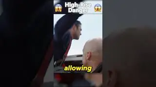 A car is suspended in mid-air, all because the driver was fighting for a parking spot!