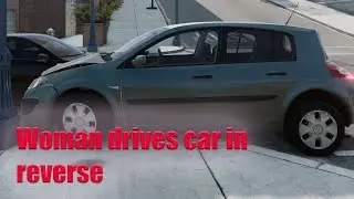 Woman drives car in reverse