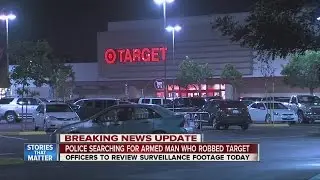 Armed Target store robber escapes, woman arrested