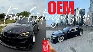 OEM Extinguisher installed on my BMW F80 M3 plus OEM door projector lights. Must have Mods!
