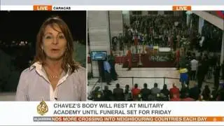 Chavez lies in state at military academy