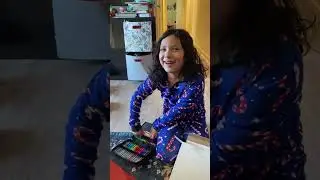 Kids opening Angel Tree gifts on Christmas morning 