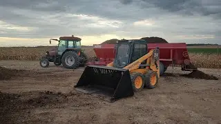 Loading and spreading Poultry litter 