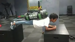 horizontal  plank with 10 kg bag by kids