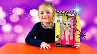 O.M.G. Lights UV Black Light Surprise Doll DAZZLE
