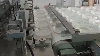 IQ-M4000 Petri Dish Filling Machine with Edge Printing and Flow Wrapping Machine!