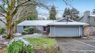Just Listed! Single Level Home Backing Green Space