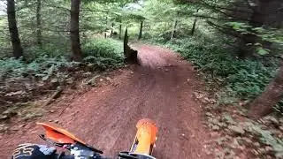 Testing the Dunlop MX53 in the mud, rocks, and roots.