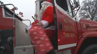 Santa Delivers Presents to Kids in Seymour on Christmas Eve