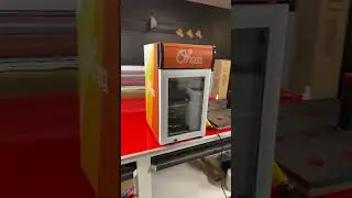 IDW G Baby countertop fridge with wrap on it.  