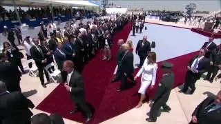 Melania Trump appears to push president&rsquo;s hand away