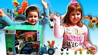 Развивающий набор Ферма Животные и синий трактор. Распаковка Поля Никита Bright Basics Tractor Pull