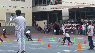 Sports day for juniors roll the ball