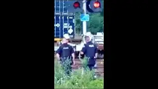 Dunkirk NY Police To The Rescue Helping Fix Broken Railroad Crossing Gate